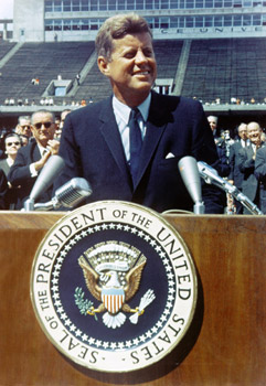 President Kennedy, at Rice Stadium in 1962, prepares the nation for the lunar landing. "It doesn’t happen accidentally," says Dunbar of the country’s bold initiative. NASA photo.