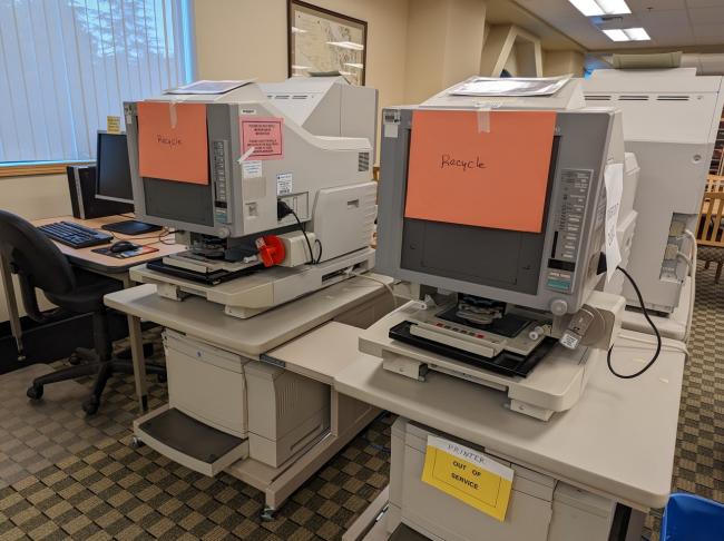 two microfiche readers ready to be recycled