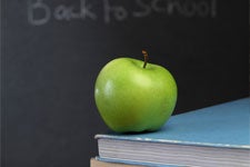 apple on stack of books