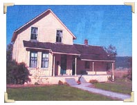 Dougherty House , taken about 1910 after being moved uphill from its previous Cherry Valley location.