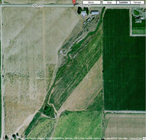 The cattle ranch, a few miles outside of Outlook, Washington is shown from space. Here, the Dunbar children work the fields and develop a work ethic second to none. Google - Imagery photo.