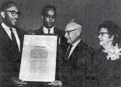 About 20 former law clerks of State Supreme
                        Court Judge Matthew W. Hill surprised the judge with a dinner in 1965 at the Rainier
                        Club. Their gifts to him included World Series tickets and plane tickets to get
                        there. From left, Seattle Municipal Court Judge Charles Z. Smith and King County
                        Superior Court Judge Robert F. Utter.