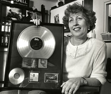 Maria Novoselic, mother of Nirvana
                    bassist Krist Novoselic, poses with a platinum record her son gave her in 1992 when
                    Nirvana’s "Nevermind" sold more than a million copies. Brian DalBalcon for The Daily
                    World, Aberdeen