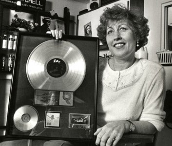 Maria Novoselic, mother of Nirvana
                    bassist Krist Novoselic, poses with a platinum record her son gave her in 1992 when
                    Nirvana’s "Nevermind" sold more than a million copies. Brian DalBalcon for The Daily
                    World, Aberdeen