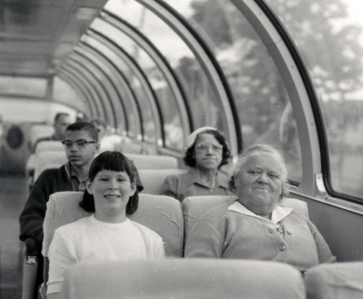 A train trip in the 1960s: James Jr. and his mother sitting behind his sister June and their grandmother, Hazel Allen.