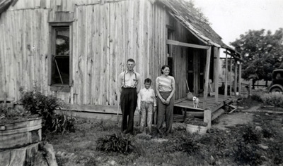 Lillian with her brothers, Lewis and Ulysses, in 1940, outside the family home.