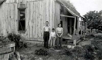 Lillian with her brothers, Lewis and Ulysses, in 1940, outside the family home.