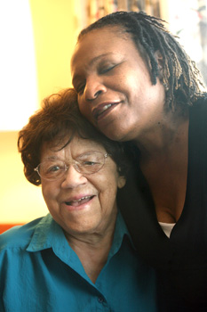 Linda Joyce, Executive Director of the Kitsap County YWCA, hugs Lillian Walker, a charter member, at a 2008 event to celebrate the Y’s 60th anniversary. Carolyn J. Yaschur, Kitsap Sun