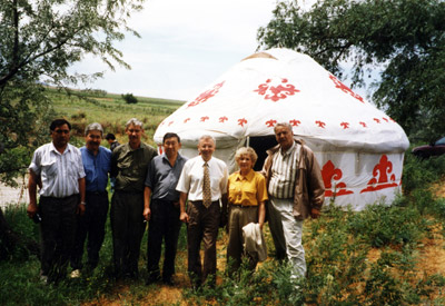 The Utters and other members of the delegation outside a yurt in Kazakhstan in 1992. Made of felt, yurts are the traditional nomadic dwelling of Kazakhstan.