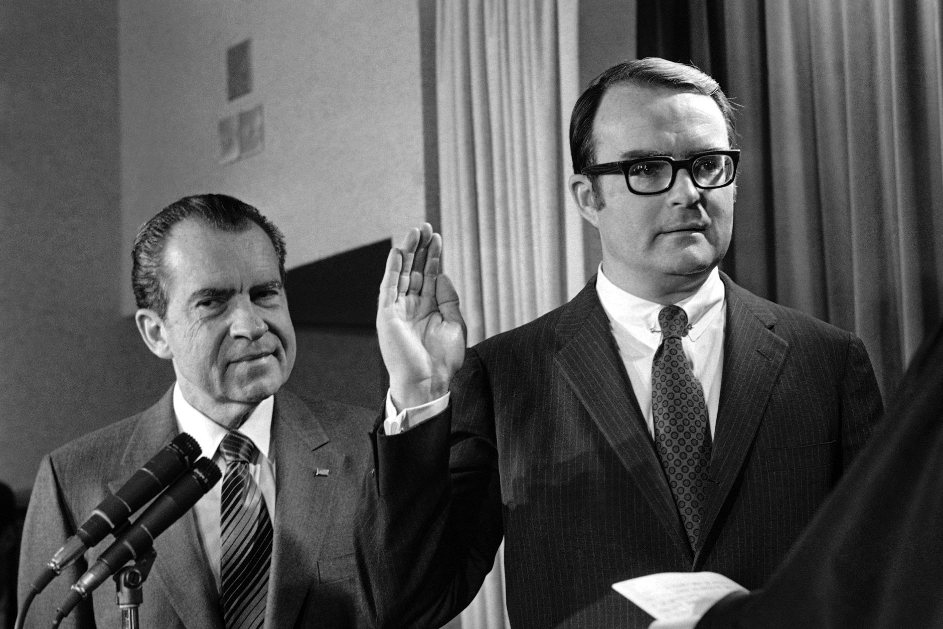 Photo of the first U.S. EPA administrator, Ruckelshaus, being sworn in alongside President Nixon.