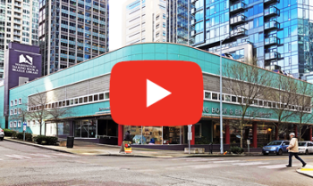 Video thumbnail of the front of the library building with a man walking through a crosswalk