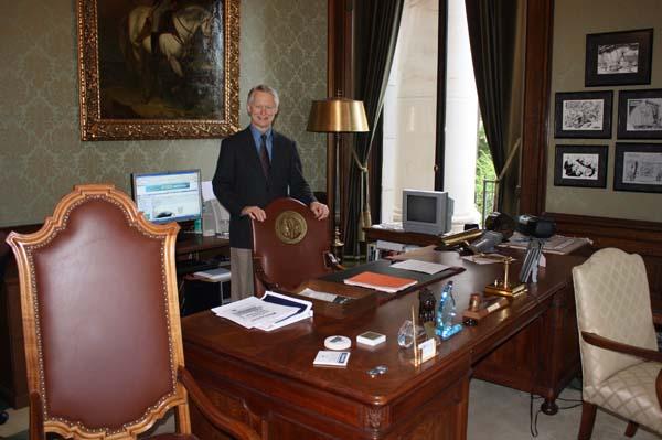 Sam's in his office