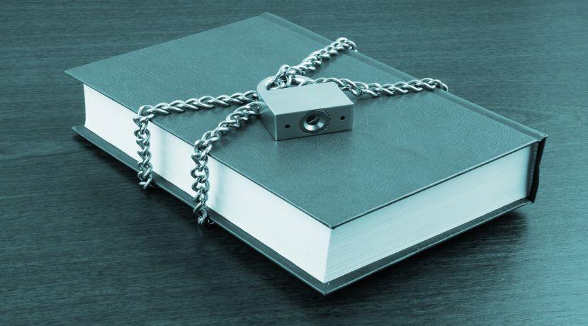 a book wrapped in a chain and lock