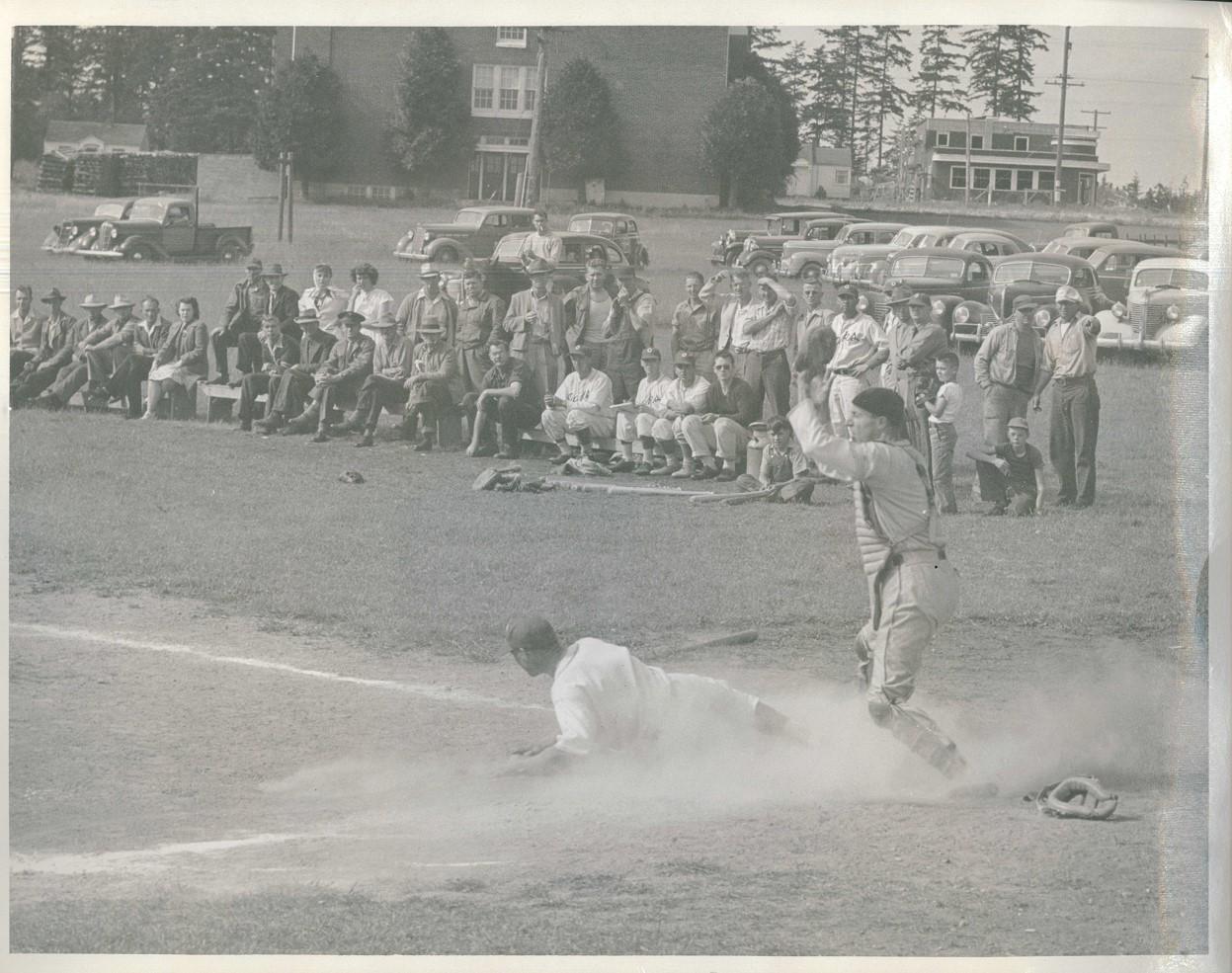 NSH Baseball, image of player sliding into home base (undated)
