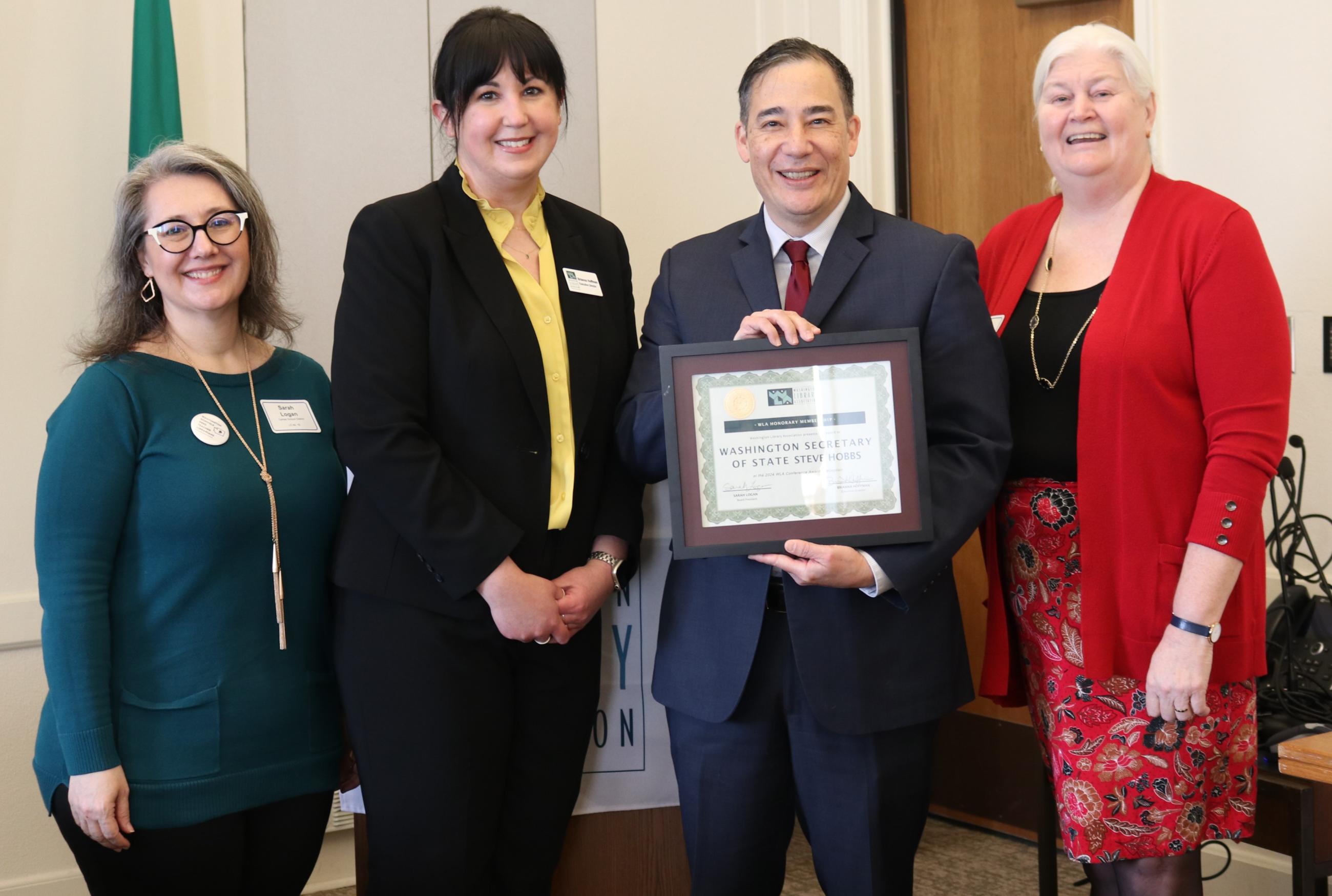 Secretary Hobbs and Washington State Librarian Sara Jones stand together after Secretary received the Washington Library Association's Honorary Membership Award for his advocacy of libraries across the state.