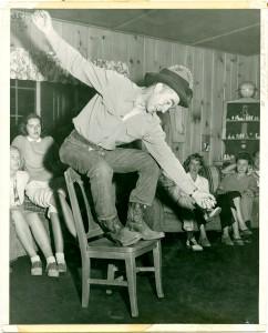 Tom Whited sings "Strawberry Roan" to guests at his dude ranch in Kittitas County.
