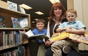 Secretary of State enjoys reading with young readers.