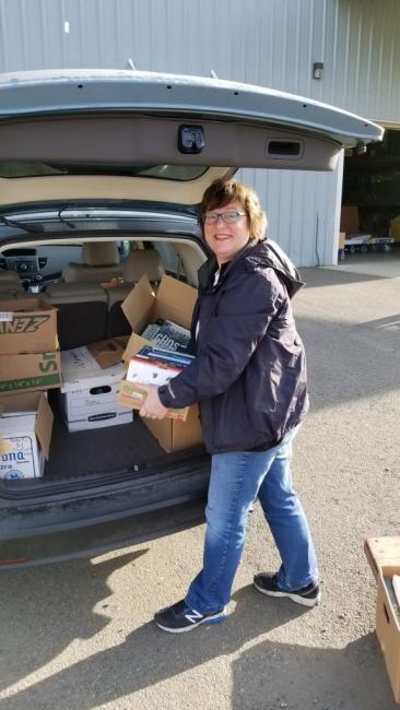 Robin Stemen, loading books