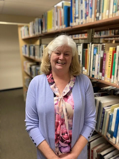 Sara Jones in a library